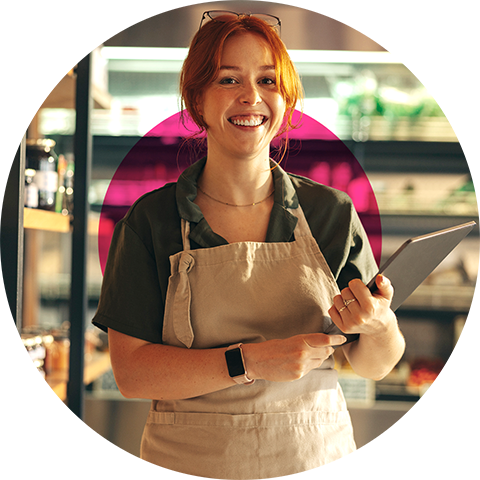 A smiling shopkeeper